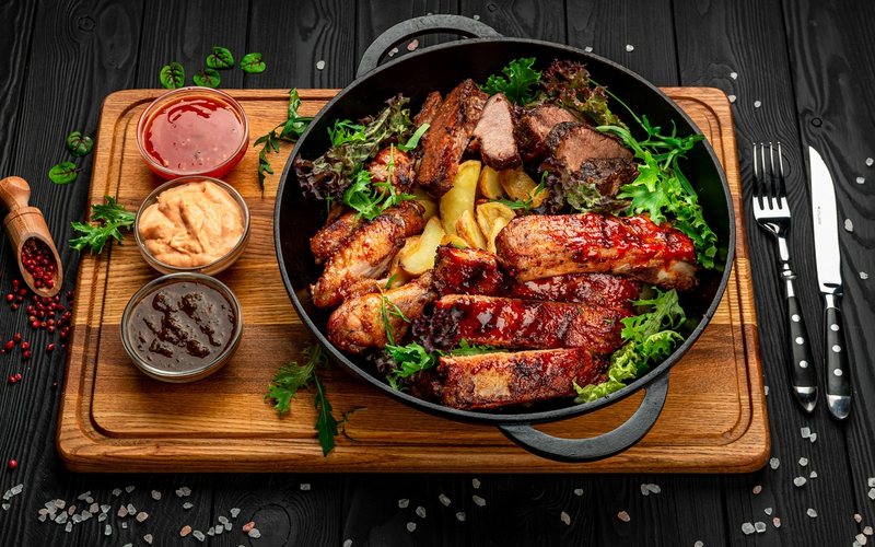 Parrillada argentina guarda algumas semelhanças com o churrasco brasileiro - AdobeStock