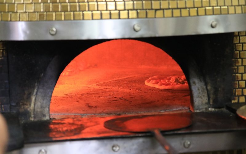 A Pizza napolitana tem no alho seu segredo de harmonização
